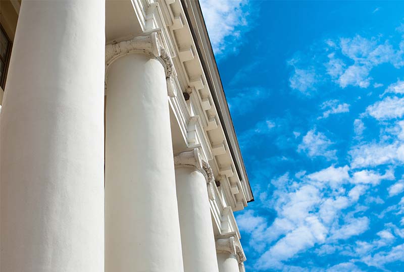 columns on building with blue sky